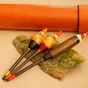 3 Paul Cook Floats with a leather case.